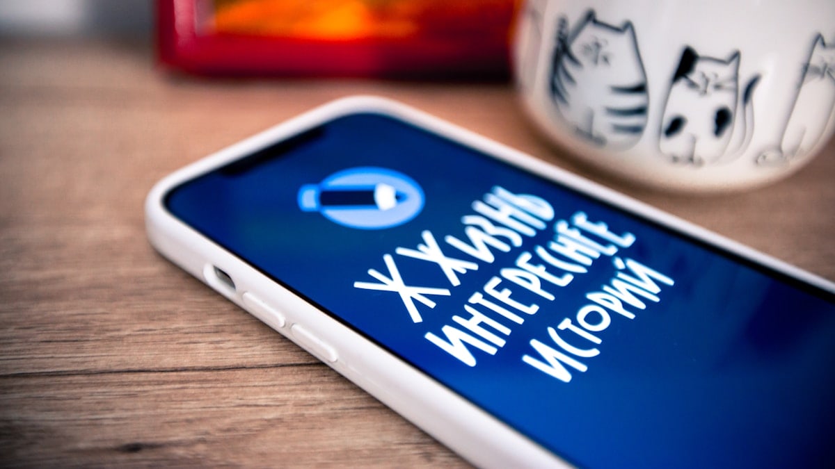 a close up of a cell phone on a table